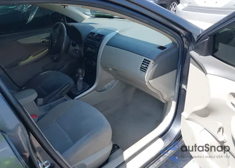 2009 Toyota Corolla from USA, damaged, VIN 1NXBU40E49Z038459